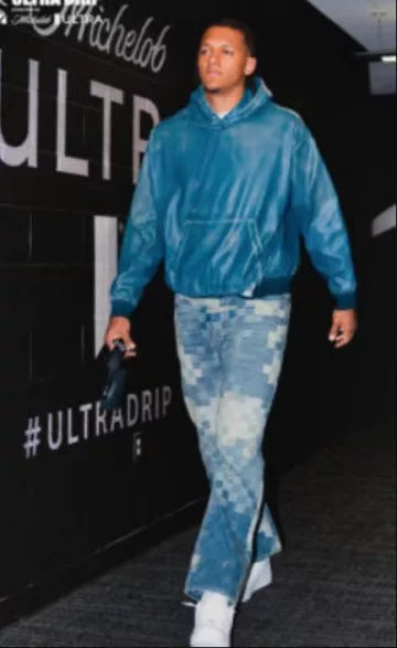 Maison Mihara Yasuhiro Blue Distressed Faux Leather Hoodie worn by Paolo Banchero on the Instagram account @orlandomagic