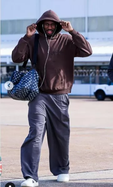 Louis Vuitton Navy & White Monogram 'Keepall 50' Bag worn by Jaren Jackson Jr. on the Instagram account @memgrizz