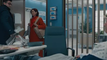 BCBGeneration Beige Sherpa Color Block Tote Bag worn by Elsbeth Tascioni (Carrie Preston) as seen in Elsbeth (S02E14)