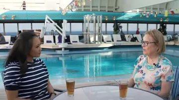 Loft Striped Puff Sleeve Sweatshirt worn by Nancy Chen as seen in CBS Mornings on March 10, 2025