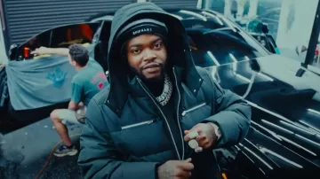 Moose Knuckles Black 'Cloud' Down Bomber Jacket worn by BossMan Dlow in BossMan Dlow - Sum Out Of Nun (Official Music Video)