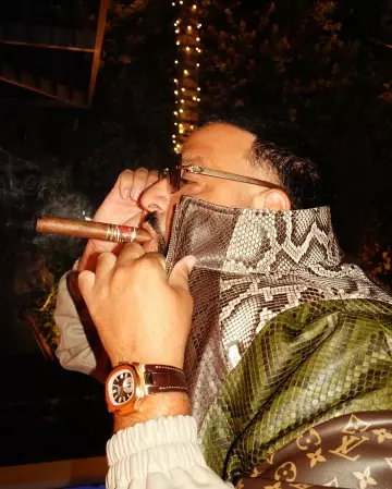 Patek Philippe Rose Gold & Brown Alligator 'Nautilus' worn by DJ Khaled on the Instagram account @djkhaled