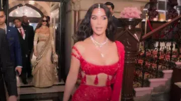 Manish Malhotra Maharani Red Saree Lehenga worn by Kim Kardashian as seen in The Kardashians (S06E06)