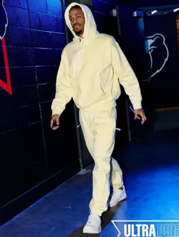 Nike Alabaster Yellow 'Solo Swoosh' Hoodie worn by Temetrius Morant on the Instagram account @memgrizz