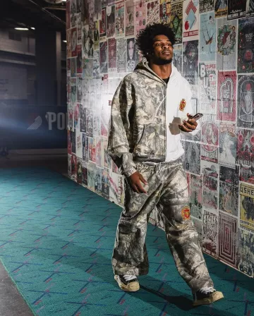 Maison Mihara Yasuhiro Black & Beige-Sole Low 'Hank' Sneakers worn by Scoot Henderson on the Instagram account @trailblazers