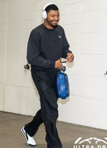 Louis Vuitton Cobalt Blue Monogram Toiletry Bag worn by Marcus Smart on the Instagram account @washwizards