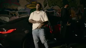 Amiri Perfect Indigo Starburst Logo Jeans usados por Lil Zay Osama en Lil Zay Osama - "Crash Out" (Video Oficial)