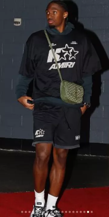 Amiri Black Mesh 'MA Stars' Layered Shorts worn by Tyrese Maxey on the Instagram account @nbafashionfits
