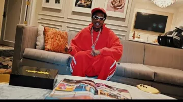 Chrome Hearts Red & White-Flame Flame Hat worn by Wiz Khalifa in Wiz Khalifa, Sledgren - Bigger Boat [Official Music Video]