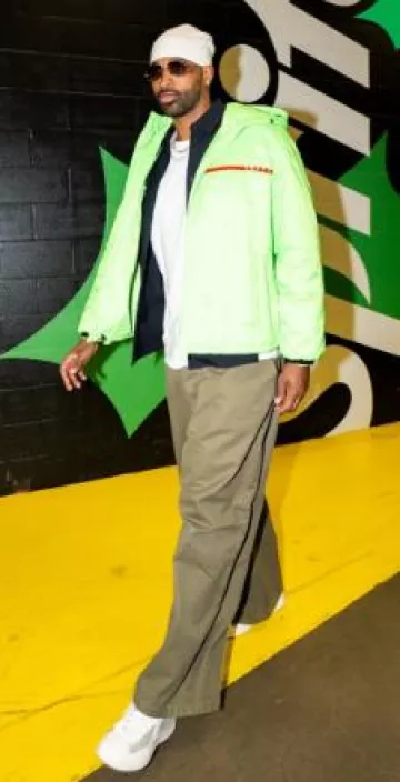 Prada Neon Green Padded Jacket worn by Tristan Thompson on the Instagram account @cavs