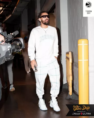 Jordan White & Light Blue Check Fleece Pants worn by Trae Young on the Instagram account @atlhawks