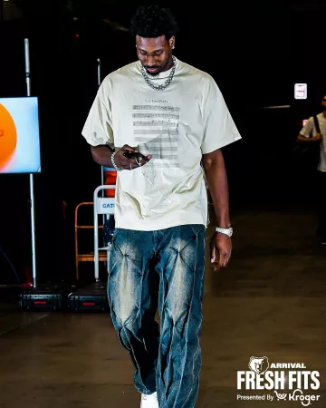 Balenciaga White 'The Torch Theme' T-Shirt worn by Jaren Jackson Jr. on the Instagram account @memgrizz