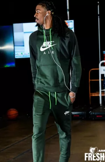 Nike Carbon Green Colorblock Fleece Joggers worn by Temetrius Morant on the Instagram account @memgrizz