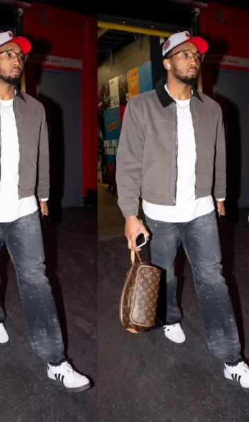 Trousse de toilette Louis Vuitton Monogram Double-Zip marron portée par Donovan Mitchell sur le compte Instagram @cavs
