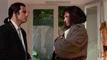 The trench coat gray Mia Wallace (Uma Thurman) in Pulp Fiction