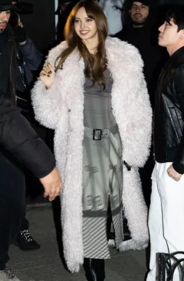 Wiederhoeft Sister Belted Jersey Midi Dress worn by Lisa at Alter Ego New York Pop Up on March 6, 2025