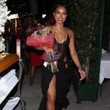 Mugler cut-out black mid-length dress worn by Karrueche Tran on the Instagram account @fashionbombdaily