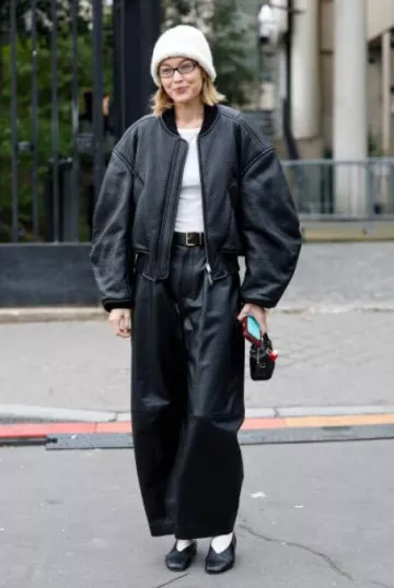 Loewe Barrel Leather Trousers worn by Gigi Hadid in Paris on March 11, 2025