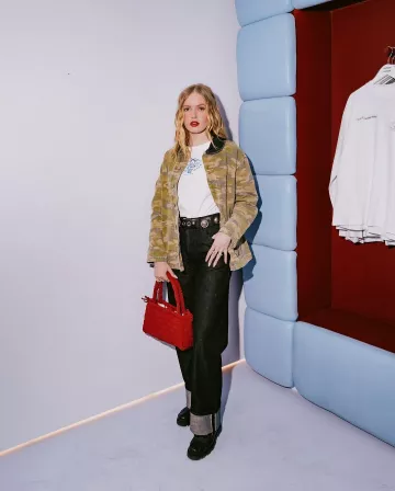 Damson Madder. Selvedge Sylvie Jeans worn by Ellie Bamber at Damson Madder Celebrates 5th Birthday with Four-Day London Pop-Up and VIP Party on March 12, 2025