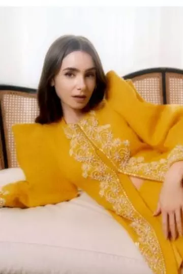 Carolina Herrera Embroidered Virgin-Wool Jacket worn by Lily Collins at  Instyle post on September 2024
