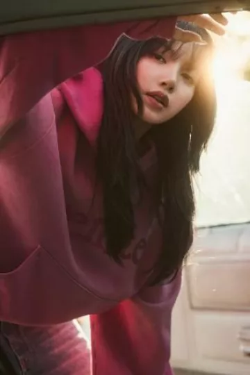 Erl Venice-Print Cotton Hoodie worn by Lisa at Elle post on September 2024