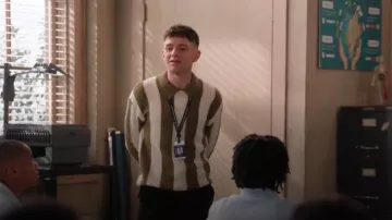 Asos Design Relaxed Boxy Fit Knit Polo Sweater In Khaki Stripe worn by Jacob Hill (Chris Perfetti) as seen in Abbott Elementary (S04E21)