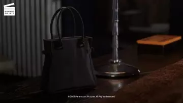 Dark Grey Bag of Andie (Kate Hudson) in How to Lose a Guy in 10 Days movie