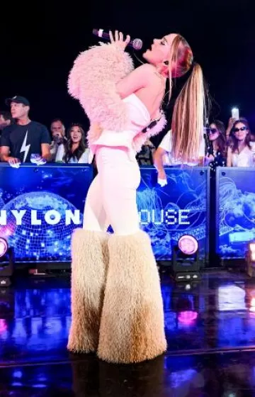 Tiffany & Co. Tiffany T Square Rap Diamond Ring worn by Dove Cameron at  the Nylon House Event in Palm Springs post on April 11, 2025.