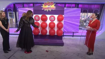 Ganni Polka-dot Chiffon Wrap Midi Dress worn by Donna Farizan as seen in Today with Jenna & Friends on April 16, 2025