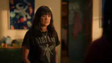 Live Nation Free People Nirvana Tee worn by Fiona De La Rosa (Martha Millan) as seen in The Cleaning Lady (S04E05)