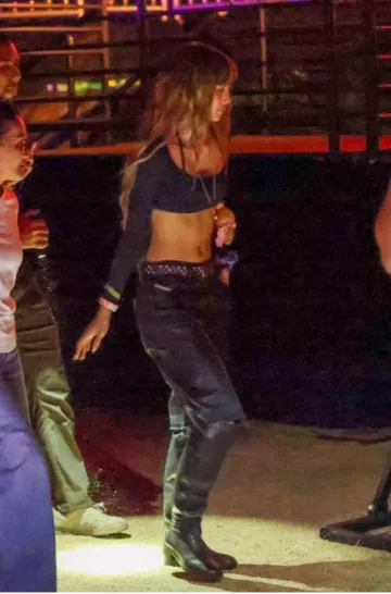 Takashi Murakami x Louis Vuitton Black Monogram Multicolore Ceinture Belt worn by Lisa at Coachella Week One on April 13, 2025