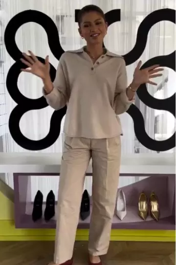 Guest in Residence Everyday Polo Top in Oatmeal worn by Zendaya Coleman at School of Style on April 14, 2025