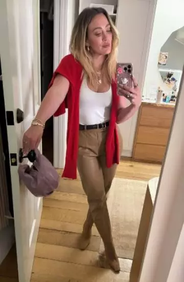 Khaite Nevada Suede Ankle Boots worn by Hilary Duff on Her  Instagram post on April 17, 2025