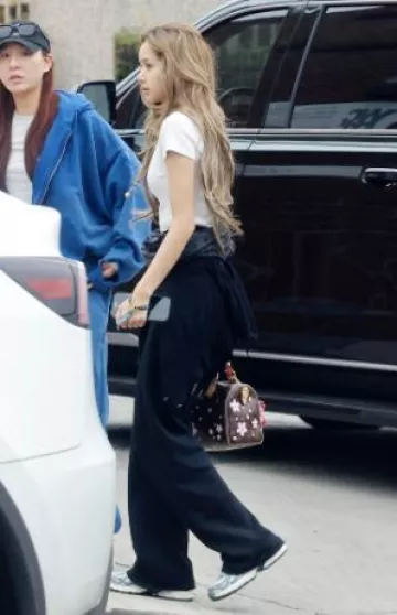 Louis Vuitton x Takashi Murakami Cherry Blossom Speedy Bandouliere worn by Lisa in Los Angeles post on April 17, 2025