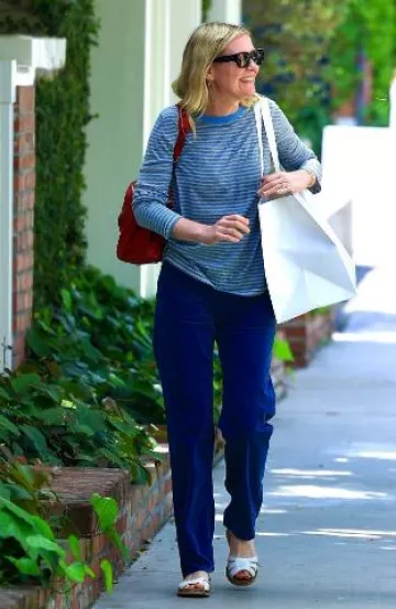 Louis Vuitton Sofia Coppola Satchel Bag worn by Kirsten Dunst in Los Angeles post on April 22, 2025