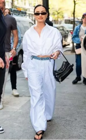 Acne Studio Camero Party Shoulder Bag worn by Demi Lovato in New York City post on April 22, 2025