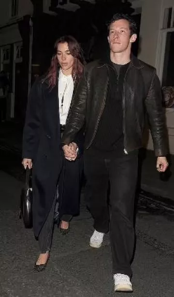 Gucci Jackie 1961 Black Medium Bag worn by Dua Lipa in  London on February 16, 2024