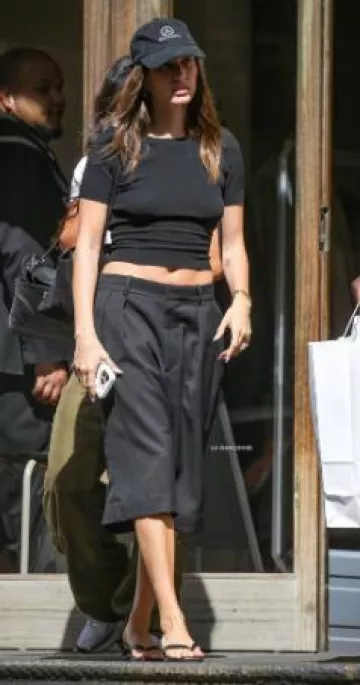 Toteme Leather Heeled Flip Flops worn by Hailey Baldwin in New York City on April 30, 2025