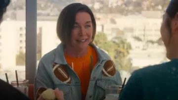 James Ascher Orange Embroidered Confetti Stripe Mason Sweater worn by Julianne Nicholson as seen in Hacks (S04E05)