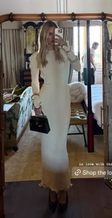 Hermes Mini Kelly Touch in Black worn by Leonie Hanne on her Instagram Story on May 6, 2025