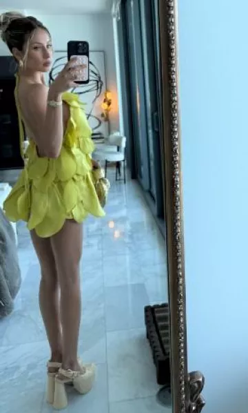 Bottega Veneta Mini Jodie in Gold worn by Alix Earle on her Instagram Story on March 15, 2025