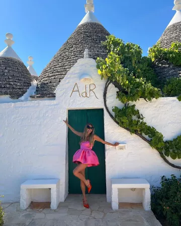 Prada Pointed Satin Mules worn by Anna Dello Russo on her Instagram on July 22, 2024