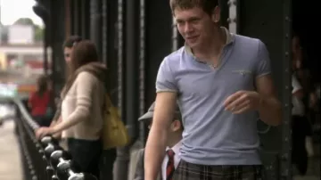 Blue polo shirt of Cook (Jack O'Connell) in Skins (S04E03)