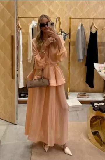 Alaia Le Teckel Small Croc-Effect Shoulder Bag worn by Leonie Hanne on her Instagram Story on May 8, 2025