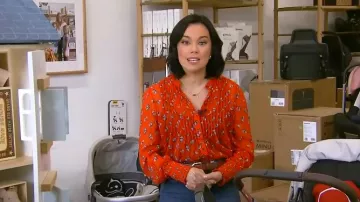 Free People Flowers in December Top porté par Jo Ling Kent comme on le voit dans CBS Mornings le 8 mai 2025