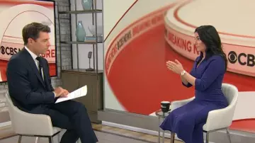 Black Halo Kensington Dress in Dark Indigo worn by Celine Gounder as seen in CBS Mornings on May 12, 2025