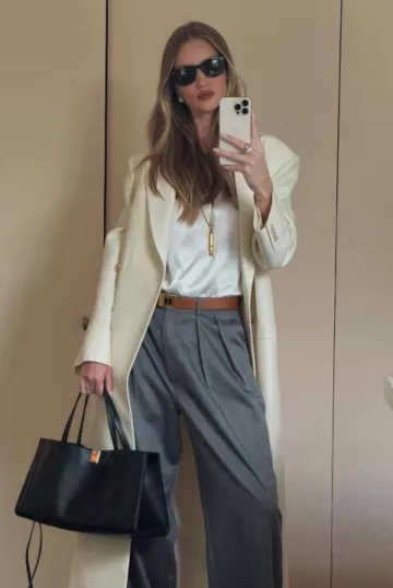 Collier pendentif sifflet Saint Laurent porté par Rosie Huntington-Whiteley sur son post Instagram le 13 mai 2025