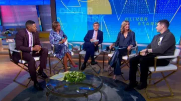 Tahari Hammered Satin Wrap Front Shirtdress worn by Robin Roberts as seen in Good Morning America on May 12, 2025
