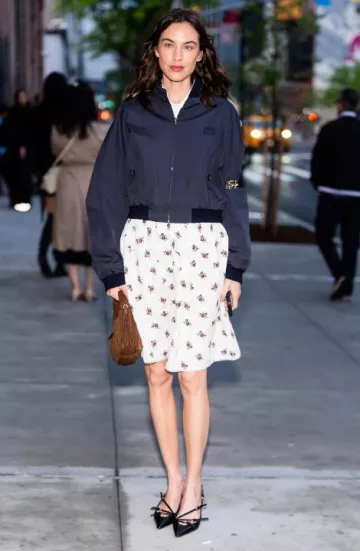 Miu Miu Printed Slubbed Poplin Skirt worn by Alexa Chung at Miu Miu Tales & Tellers on May 9, 2025
