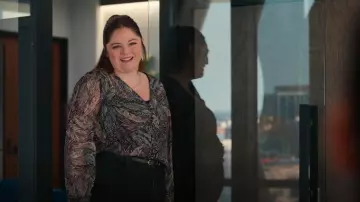 Aqua Metallic Leaf Puff Sleeve Blouse worn by Kayla (Megan Stalter) as seen in Hacks (S04E08)